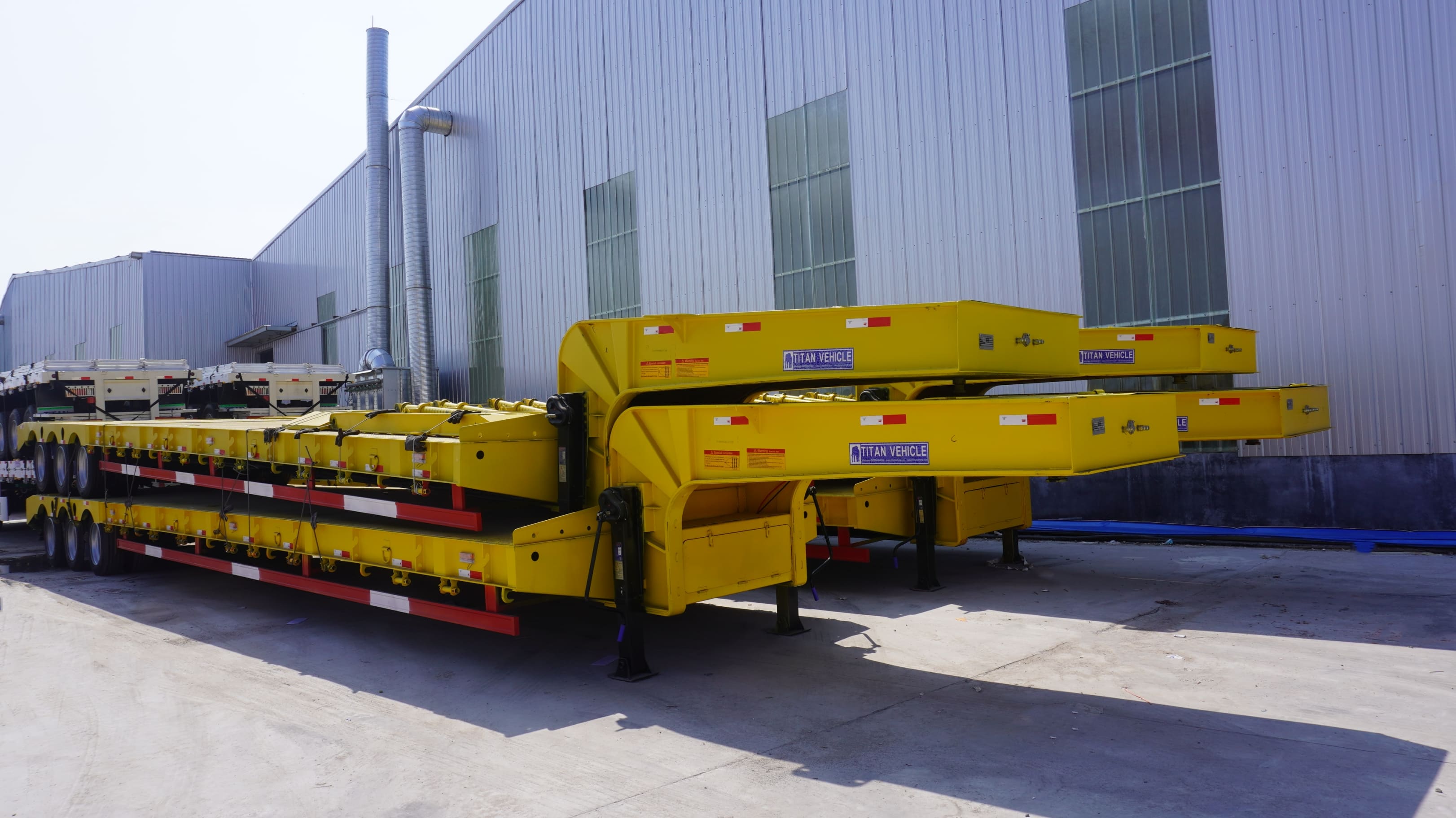 3 Axles 60 Ton Low Bed Trailer Truck Price for Sale in Nigeria Logos