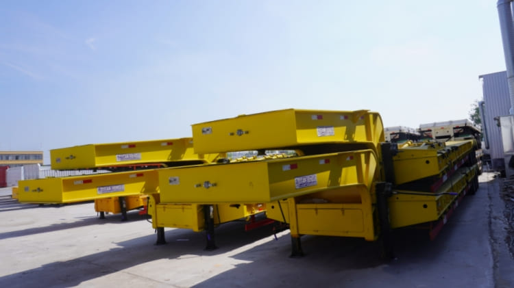 3 Axles 60 Ton Low Bed Trailer Truck Price for Sale in Nigeria Logos